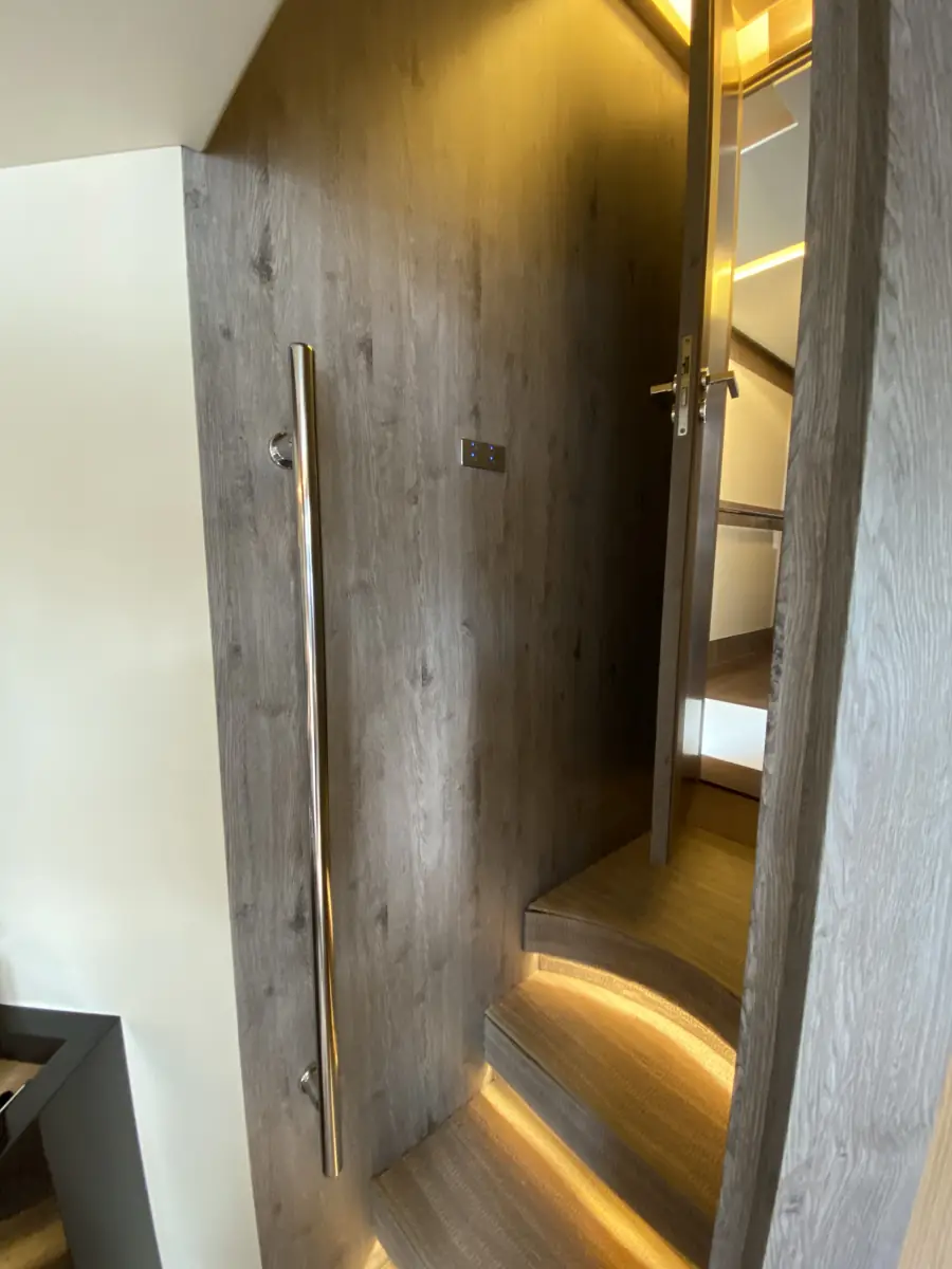 Yacht cabin doors refinished in grey oak woodgrain film